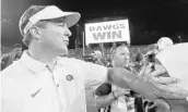  ?? MIKE STEWART/AP ?? Georgia coach Kirby Smart has done a remarkable job turning the Bulldogs into a playoff semifinal contender.