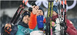  ?? JONATHAN NACKSTRAND/AFP/GETTY IMAGES ?? Federico Pellegrino, left, Johannes Hoesflot Klaebo and Alex Bolshunov after the men’s cross-country individual sprint final.