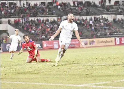  ??  ?? TWO-GOAL SHOW: Brazilian forward Luiz Carlos Junior marks his return to the squad with a brace to lead Sabah to a 3-1 Premier League win over PDRM at the Likas Stadium last night. — Photo courtesy of Safa Media