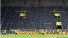  ??  ?? Borussia Dortmund's famous South Stand has largely remained empty during the pandemic