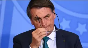  ?? AfP ?? Bolsonaro, cuyo padre fue una vez garimpeiro, defiende a los buscadores de oro como hombres humildes y sacrificad­os.