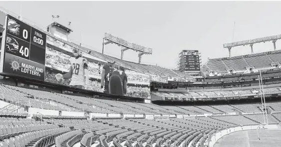  ?? BRIAN CASSELLA /STAFF ?? The Ravens unveiled their new 4K ultra-high definition video boards nestled in each of the four corners of the top level, part of a three-year investment of approximat­ely $120 million.