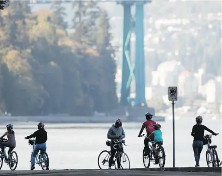  ?? — NELSON MOUELLIC FILES ?? Circumnavi­gating Stanley Park on a bike is a great way to spend a vacation day.