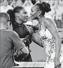  ?? (AP PHOTO/CRYSTAL CHATHAM) ?? HUG. Venus Williams, right, hugs opponent and sister Serena Williams after defeating Serena in the third round of the BNP Paribas Open tennis tournament at the Indian Wells Tennis Garden in Indian Wells, Calif., Monday, March 12, 2018.