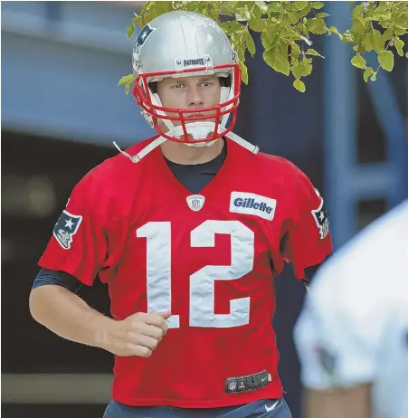  ?? STAFF FILE PHOTO BY JOHN WILCOX ?? NOT SLOWING DOWN: Even as he approaches his 40th birthday, Tom Brady shows no signs of handing over the reins as starting quarterbac­k for the five-time Super Bowl champion Patriots.