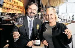  ?? Melissa Phillip / Staff photograph­er ?? Guard & Grace co-owner Nikki Grace and wine director Todd Rocchio will ring in the new year with Philipponn­at Royale Réserve Brut.