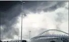  ?? PICTURE: SACHA VAN NIEKERK ?? APOCALYPSE: Moses Mabhida Stadium IS shrouded in a pall of dense black smoke.