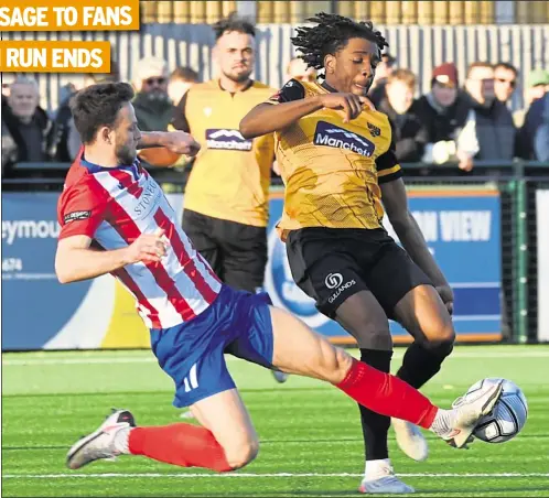  ?? Picture: Steve Terrell ?? Maidstone’s Dominic Odusanya in the thick of the action against Dorking on Saturday