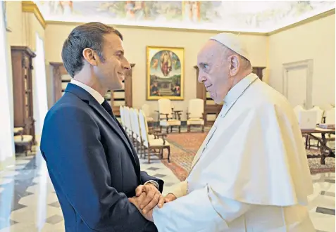  ?? ?? Pope Francis meets Emmanuel Macron, the French president, at the Vatican yesterday
