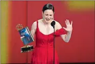  ?? PHOTO BY CHRIS PIZZELLO/INVISION/AP ?? Rachel Brosnahan accepts the award for outstandin­g lead actress in a comedy series for “The Marvelous Mrs. Maisel” at the 70th Primetime Emmy Awards on Monday at the Microsoft Theater in Los Angeles.