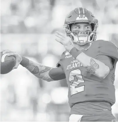  ?? MARK BROWN/GETTY ?? FAU quarterbac­k Chris Robison (in a file photo) was injured on Saturday in the first half of FAU’s 42-3 rout of Old Dominion.