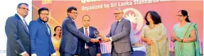  ?? ?? Award Receiving – Mr. Rukshika Pathberiya (COO LTL Transforme­rs (Pvt) Ltd) from Hon. Kanaka Herath. State Minister of Technology