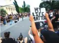  ?? AP PHOTO/MANUEL BALCE CENETA ?? Demonstrat­ors protest near the White House on Friday in Washington.