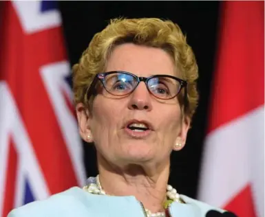 ?? FRANK GUNN/THE CANADIAN PRESS ?? On Monday, Ontario Premier Kathleen Wynne committed to implementi­ng a cap-and-trade system, meaning Canada’s most populous province will now put a price on carbon pollution.