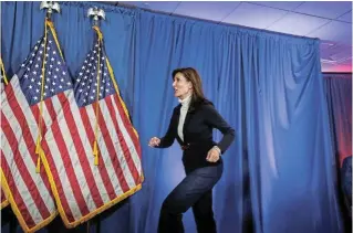  ?? /Reuters ?? Willing and eager: Republican presidenti­al candidate Nikki Haley steps onto the stage at a campaign event in Portland, Maine, on Sunday.