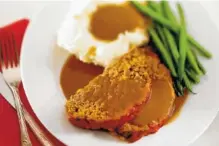  ??  ?? 101 Coffee Shop Meatloaf with mashed potatoes, gravy and green beans.