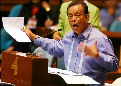  ?? —INQUIRER FILE PHOTO ?? SENATOR’S SCRUTINY Sen. Aquilino “Nene” Pimentel Jr. questions the certificat­es of canvass during a joint session of Congress convened to canvass the votes of the 2004 presidenti­al election.