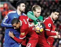  ??  ?? Liverpool’s Loris Karius, Joel Matip and Emre Can (right) in action with Leicester City’s Vicente Iborra (left) during the English Premier League match at Anfield, in Liverpool, Britain in this Dec 30, 2017 file photo. — Reuters photo