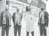  ?? INTER MIAMI CF ?? From left: Inter Miami managing owner Jorge Mas, chief soccer officer and sporting director Chris Henderson, coach Phil Neville and co-owner/president of soccer operations David Beckham stand together on Friday at Inter Miami CF Stadium in Fort Lauderdale.