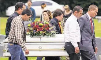  ?? Eli Baylis / Hattiesbur­g American via Associated Press ?? Pallbearer­s carry the casket of 6-year-old Jeremy Mardis to the grave site Monday at Beaumont Cemetery. Jeremy’s father, Chris Few, remained hospitaliz­ed and could not attend the funeral.