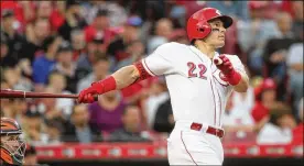  ?? DAVID JABLONSKI / STAFF ?? Derek Dietrich begins a rehab assignment today. His return from the injured list after that will add to the Cincinnati Reds’ roster crunch.