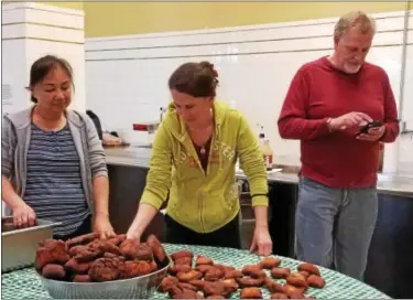  ?? SUBMITTED PHOTO ?? The Hamburg Community Group from Fleetwood Bible Church made more than 500 fastnachts using Rich Bracy’s late grandmothe­r’s recipe. The fastnachts were donate to the men at the Hope Rescue Mission in Reading.