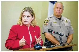  ?? JAY JANNER / AMERICAN-STATESMAN ?? Travis County Sheriff Sally Hernandez speaks at a Wednesday news conference at the sheriff’s office about the release of Julio Cesar Mendoza-Caballero. At right is Maj. Wes Priddy.