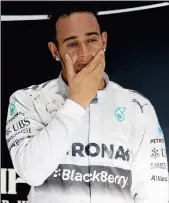  ?? Picture: ARCHIVES ?? TEARS OF JOY: Lewis Hamilton of Mercedes celebrates on the podium after winning the Abu Dhabi F1 Grand Prix and the world championsh­ip back in November. Hamilton says he can dominate again this season in his new car.