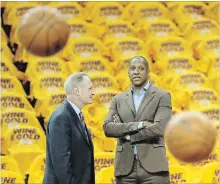  ?? STEVE RUSSELL TORONTO STAR FILE PHOTO ?? Popular Raptors broadcaste­r Jack Armstrong, left, chats with the NBA team’s president, Masai Ujiri, in Cleveland on May 25, 2016.