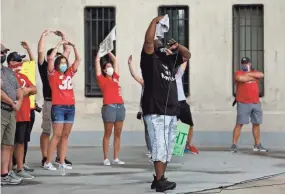  ??  ?? Randy Wade, father of Ohio State player Shaun Wade, leads a rally calling for the Big Ten to go ahead with fall football on Aug. 29.