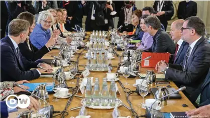  ?? ?? Coalition partners were meeting at Meseburg to thrash out policy on Ukraine after past criticism