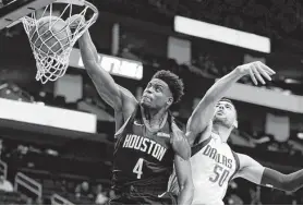  ?? Michael Wyke / Associated Press ?? Rockets forward Danuel House Jr., left, is averaging 8.4 points and three rebounds per game after nine contests.
