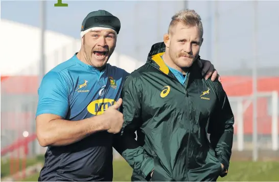  ?? Picture: Gallo Images ?? THE LIGHTER SIDE. Springbok eighthman Duane Vermeulen jokes around with prop Vincent Koch during their training session at the WSC Trefforest Grounds this week.