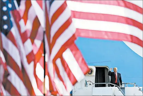  ?? ALEX BRANDON/AP ?? President Donald Trump arrives to speak at a campaign rally Sept. 21 at Dayton Internatio­nal Airport in Ohio.