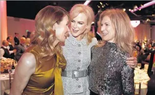  ?? Al Seib Los Angeles Times ?? LAURA DERN, left, Nicole Kidman and Academy of Motion Picture Arts and Sciences CEO Dawn Hudson visit at the Oscars nominees luncheon this year at the Beverly Hilton Hotel.