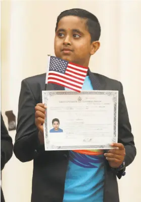  ??  ?? Union City resident Avneesh Lava, 10, was one of 26 children receiving certificat­es of citizenshi­p from U.S. Citizenshi­p and Immigratio­n Services.