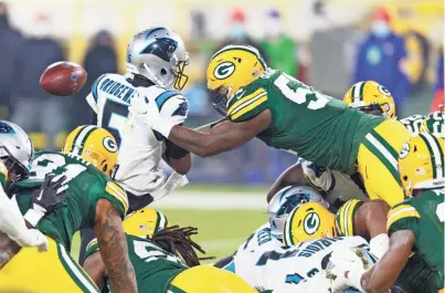  ?? JEFF HANISCH / USA TODAY SPORTS ?? Green Bay linebacker Krys Barnes forced a big turnover when he caused Carolina quarterbac­k Teddy Bridgewate­r to fumble while trying to score Saturday.