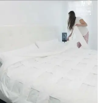  ?? SMARTDUVET ?? Smartduvet, which attaches to any duvet, makes a bed with a press of a button.
