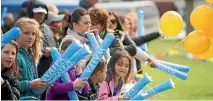  ??  ?? Crowds flocked to Camridge to welcome their Olympians including, below, Genevieve Behrent, Rebecca Scown and Mahe Drysdale.