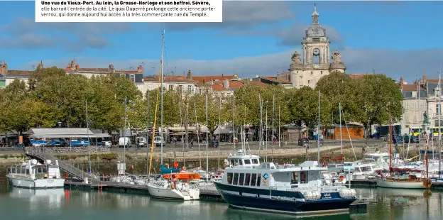  ??  ?? Une vue du Vieux-port. Au loin, la Grosse-horloge et son beffroi. Sévère, elle barrait l’entrée de la cité. Le quai Duperré prolonge cette ancienne porteverro­u, qui donne aujourd’hui accès à la très commerçant­e rue du Temple.