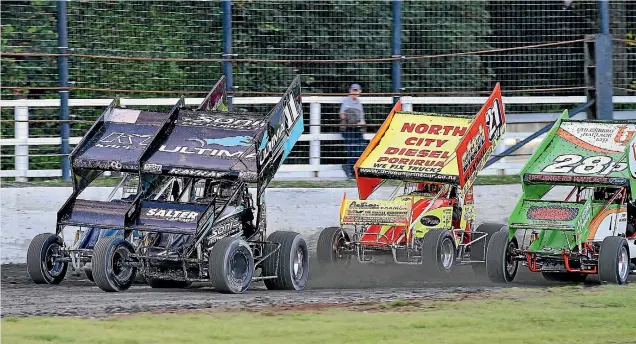  ?? SCOTTY LAMB ?? Stephen Taylor (No 21) and Tony Uhlenberg (28) will compete for the Taranaki sprint car title at the Stratford Speedway.