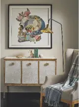  ??  ?? LEFT Skull framed collage, £360;Dalu faux shagreen sideboard, £2,785; Launceston linen armchair in Natural, £855; Merton floor lamp, £415.