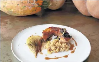  ?? Kirk McKoy Los Angeles Times ?? CHEF GARY MENES of Le Comptoir accompanie­s roasted winter squash with wheatberri­es.