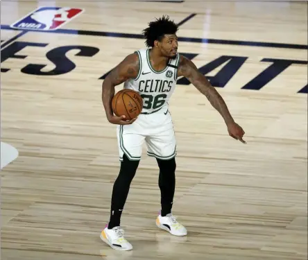  ?? KIM KLEMENT ?? Boston Celtics guard Marcus Smart (36) gestures during the second half of Game 3 of an NBA basketball first-round playoff series against the Philadelph­ia 76ers, Friday, Aug. 21, 2020, in Lake Buena Vista, Fla.