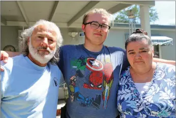  ?? Guy Mccarthy
/ Union Democrat ?? Randy Hass, his wife, Ruth, both 63 (above), and their grandson Luke Kear, 18, are concerned about what they believe is an aggressive mountain lion in their Peppermint Creek neighborho­od off Rawhide Road in Jamestown. Randy Hass has been issued a non-lethal hazing permit (right) to try to deal with the lion.