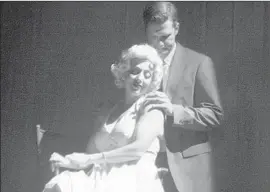  ?? Cheryl A. Guerrero Los Angeles Times ?? THE “OUTER” Marilyn, played by Jamie Chamberlin, is caressed by Lee Gregory.