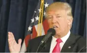  ?? EVAN VUCCI/ASSOCIATED PRESS ?? Republican presidenti­al candidate Donald Trump speaks during a news conference at Trump National Doral Wednesday in Doral, Florida.