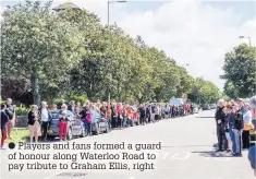  ??  ?? Players and fans formed a guard of honour along Waterloo Road to pay tribute to Graham Ellis, right