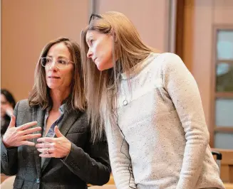  ?? Richard Harbus/Pool photo ?? Michelle Troconis, right, speaks with her attorney, Audrey Felsen, on the sixth day of her trial in state Superior Court in Stamford on Friday.