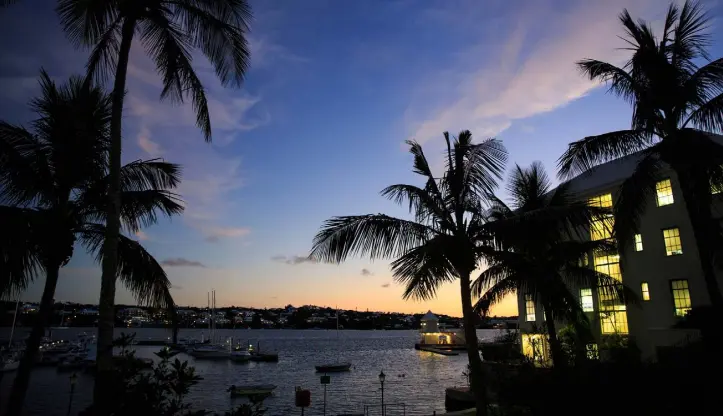  ??  ?? IN THE SHADOWS: A view of Hamilton Harbour in Bermuda at dusk last week. Money from the Queen’s private fund is said to have been paid into an offshore fund on the British island territory